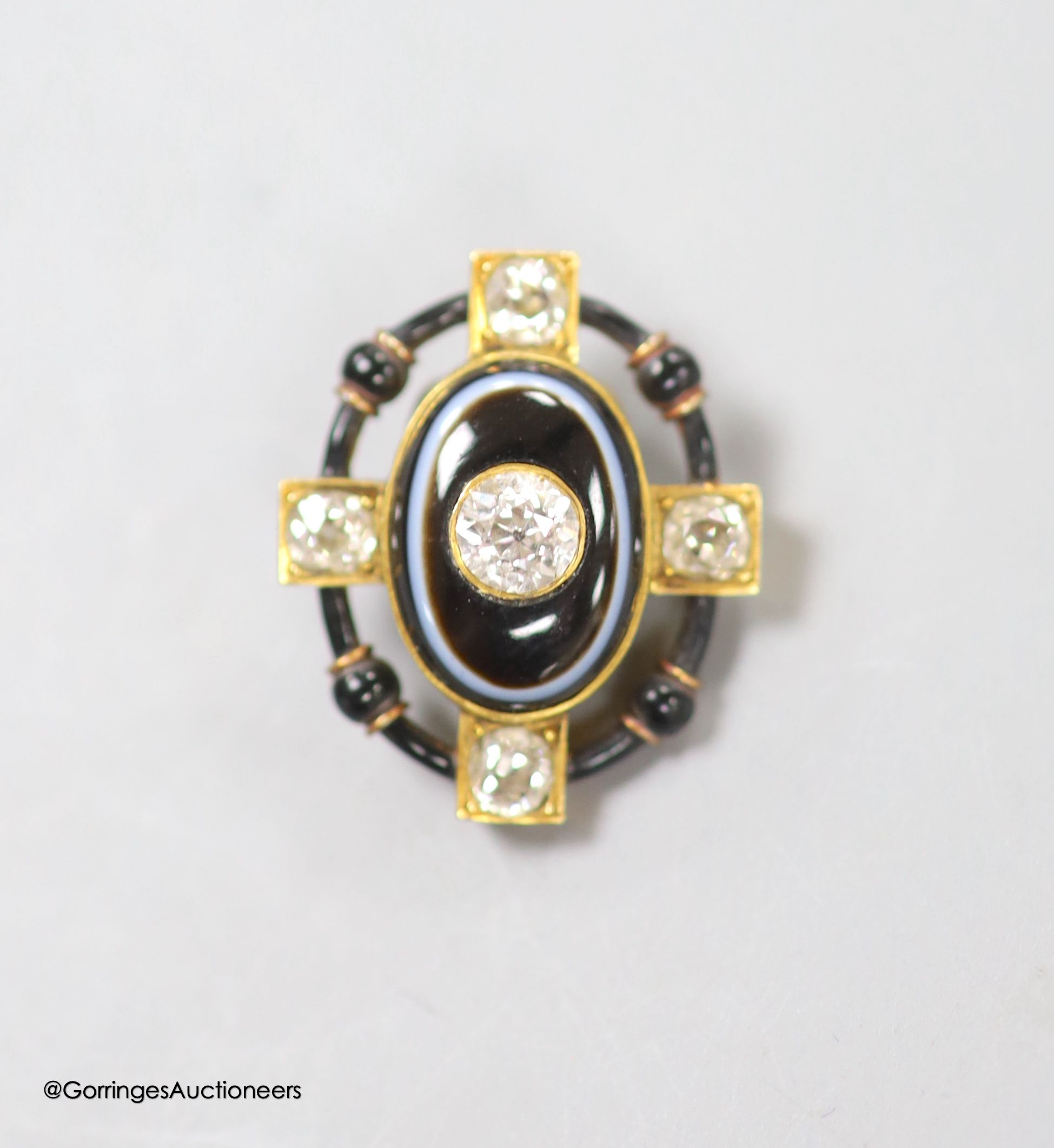 A Victorian yellow metal, banded agate, diamond and black enamel set mourning stick pin head, (no pin), 21mm, gross weight 4.7 grams